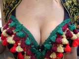 Tassled cleavage   I wonder what happens when you pull that tassel over there