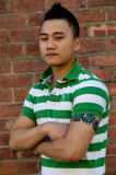 Asian youth with tattoo