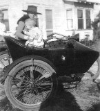 1920 - little James (left) and Jack High with their mom Ruby High in the sidecar of an Indian motorcycle