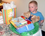 August 2008 - Kyler with some presents from us