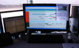 2009 - a view of the gate plotting software on a monitor with a print of the old manual gate board in the upper right corner