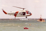 Early 1980s - air crew members of CG Reserve Unit Air Station Miami in wet drill training with HH-52A #CG-1419