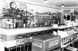 1940s - Harold Hubbard working the counter at Hubbards Kubbard