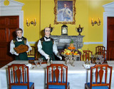BUTLERS IN A DINING ROOM