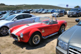 1965 Shelby Cobra stands out at Laguna Secas dusty parking lot during the 2008 Monterey Historic Automobile Races.