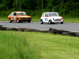 1993 Saab, left, and Austin Mini Cooper