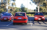 Three red cars