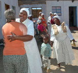Rose Makibi, the ministers wife, greeting Susan