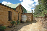 Kitchen courtyard with a rainwater barrel