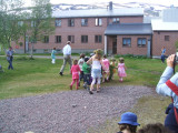 Children carrying the tree which we danced around