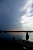 STANDING ON THE DOCK AT DUSK