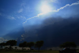 SUN SHINES ABOVE THE STORM CLOUDS