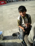 Shoeshine, Coban, Guatemala. I pay 10X the going rate after haggling down to half price, hence the smile