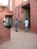 074 Curator with guests at slave house.jpg