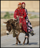 Girls riding a donky in Mheimideh