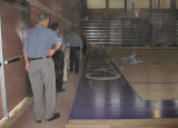 Inspecting the new gym floor  .. 6614