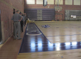 Inspecting the new gym floor  .. 6615