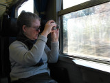 Margaret capturing a view from the train .. A3888