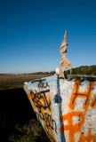 Moonset, Folly grafitti boat, with bra and f word