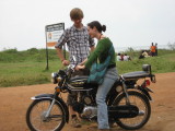 Riding motorcycles around the island with Tom and Rosey.