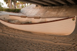 Boat under a bridge
