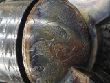 Scrollwork on Revolver recoil shield