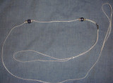 White cord with lavendar beads