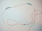 Lead 3  Gold and White cord with blue beads
