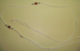 Lead 1 White Ird. cord with red, silver and white beads