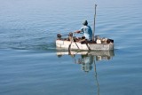 Fisherman in Styrofoam Boat