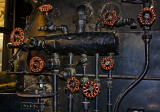 Eight Red Faucets
