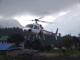 Helicopter approaching Lukla Airport Nepal.JPG
