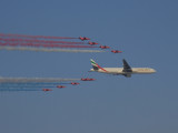 Emirates 777 with the Red Arrows Dubai Air Show 2007.JPG