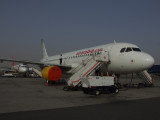 1641 19th March 08 Conversion of Vuelling A320 to Air Arabia Livery at Sharjah Airport.JPG