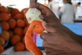 the orange juice seller at work