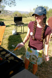 Volunteer Hiker Flipping Burgers