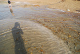 Salt deposits forming under water.