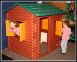 Noelle and Kylie in the log cabin