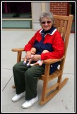 Gram enjoys the rocking chairs on the sidewalks