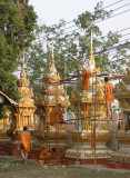 Monks patching up, Wat Chantabuli (seen from hotel room)