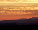 SUNSET OVER MILLS RIVER