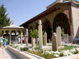 Tombs and ablution fountain in front of Mevlana Museum in Konya