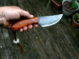 Amboyna Burl Knife in Hand.jpg