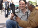 Cristian with a black cobra in the Square of Marraqueix