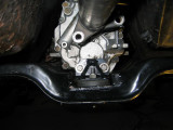 View of the modded crossmember  bracket in the car