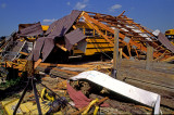 (METE75) Metal building sides formed to shape of bus, Plainfield F5 Tornado, Plainfield, IL