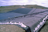 (ENV4) Geomembrane with fused seams overlying HDPE liner on slopes, Lake County, IL