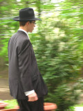 Passerby With Yellow Tie