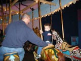 joeys first solo carousel ride on a horse