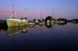 Boats at Turf Locks on the Exeter Canal with moon